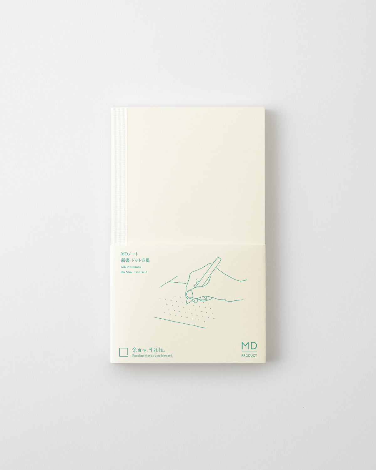 Midori MD B6 Slim dot grid notebook with cream cover and turquoise printed paper band
