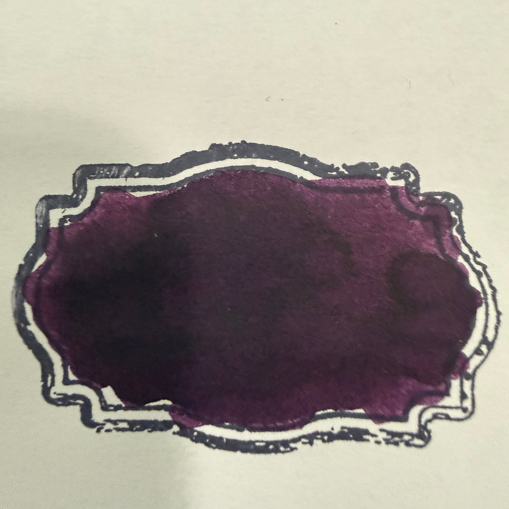 violet-green-sheen-ink-swatch.jpg
Swatch of Wearingeul Edward Hyde fountain pen ink showing dark violet color and green sheen