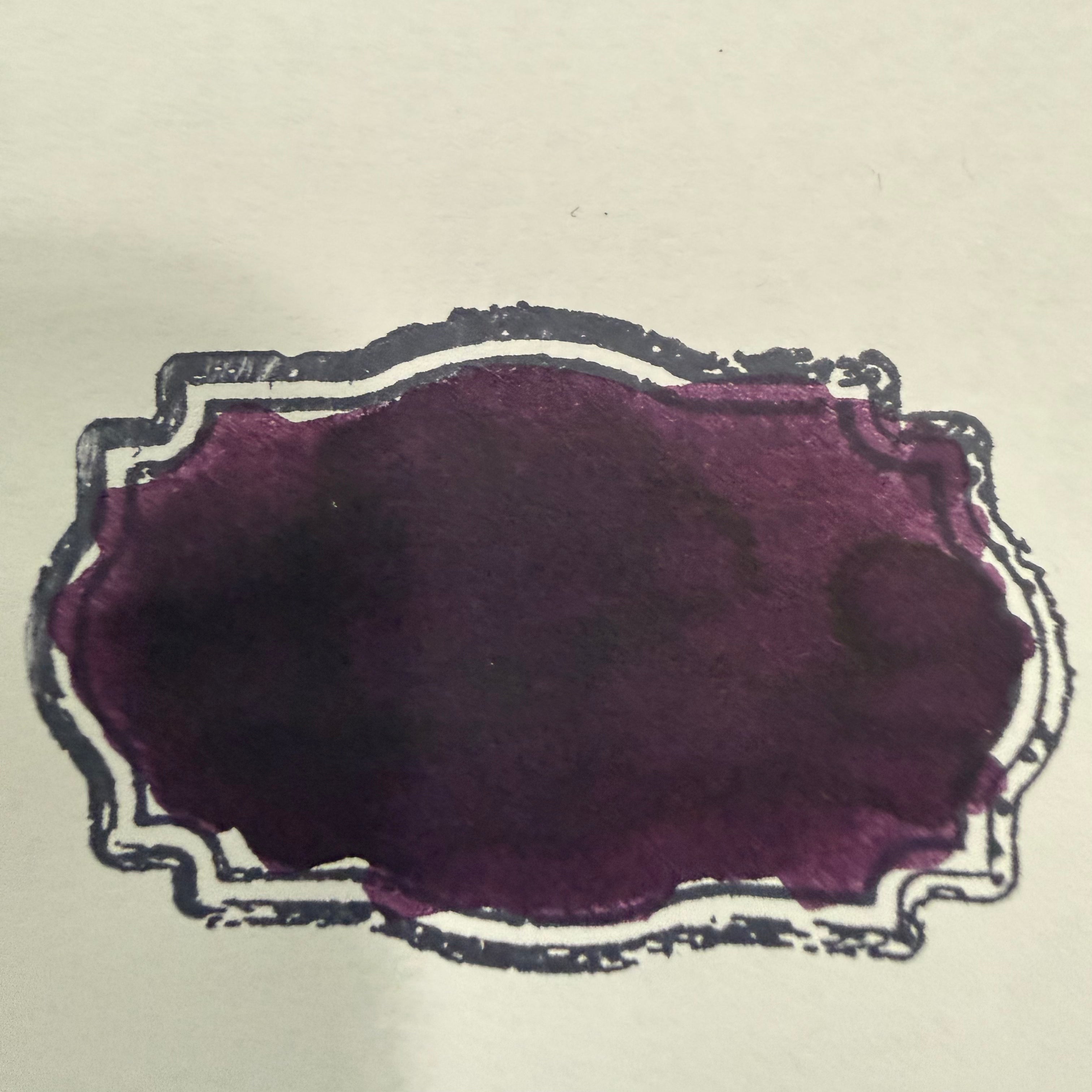 violet-green-sheen-ink-swatch.jpg
Swatch of Wearingeul Edward Hyde fountain pen ink showing dark violet color and green sheen