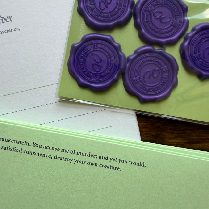 Purple adhesive wax seal stickers included with the Wearingeul Frankenstein Letter Writing Set