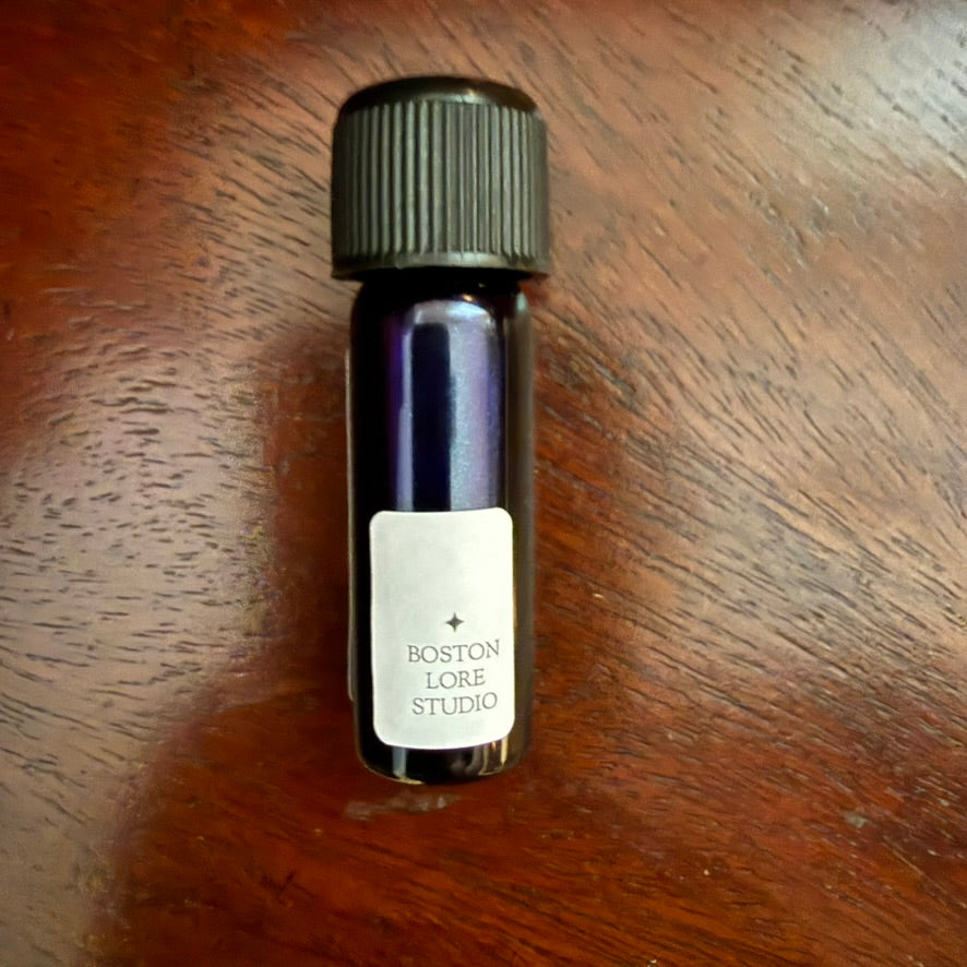 Wearingeul Frankenstein purple fountain pen ink visible through a 5 mL glass Archive Bottle