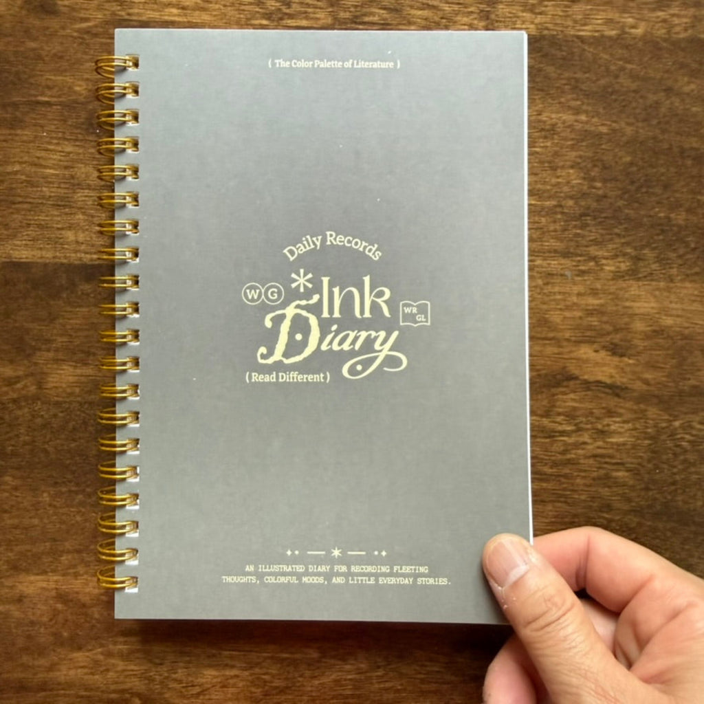 Wearingeul Ink Diary held in hand showing compact B6 size
