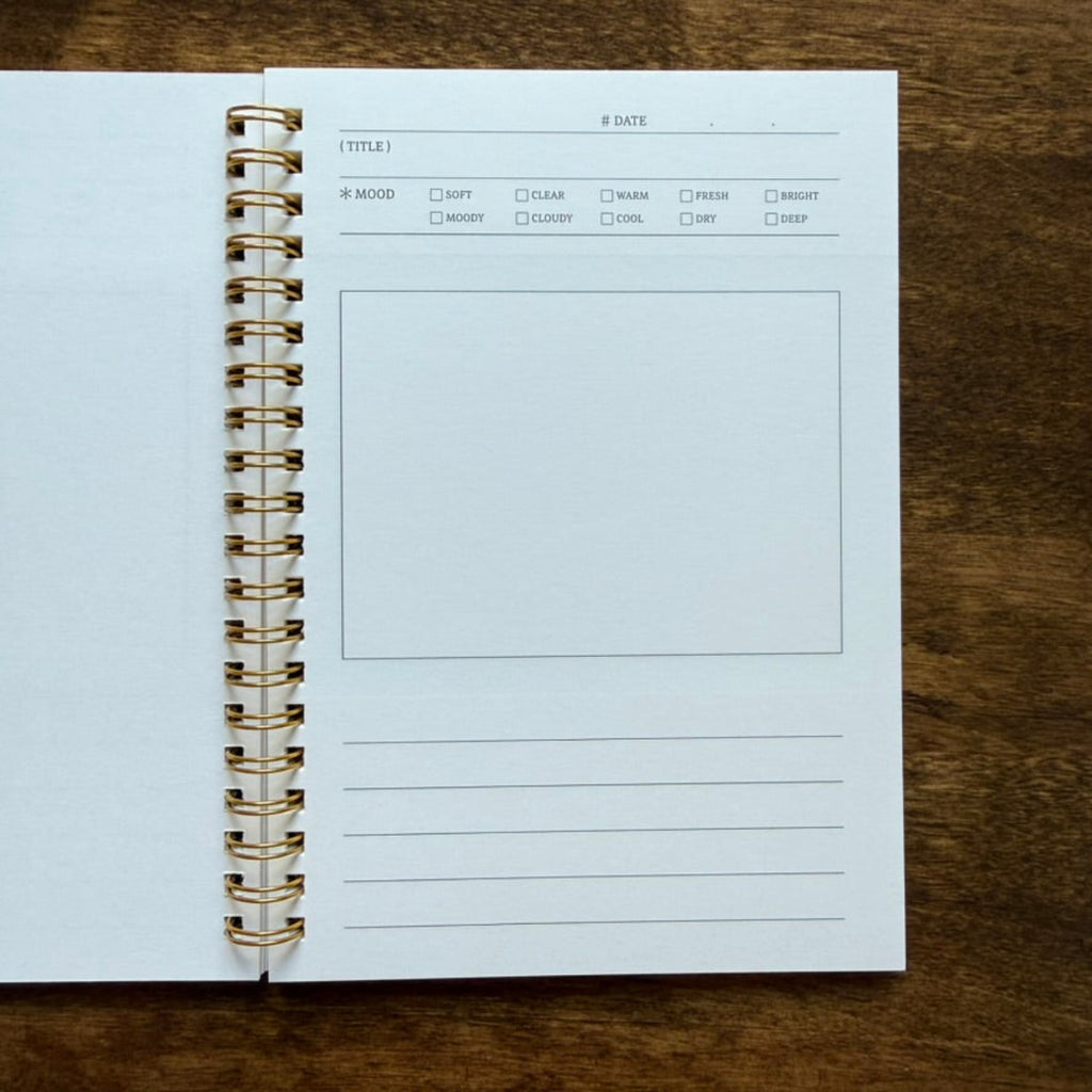 Open Wearingeul Ink Diary showing structured pages for recording fountain pen inks
