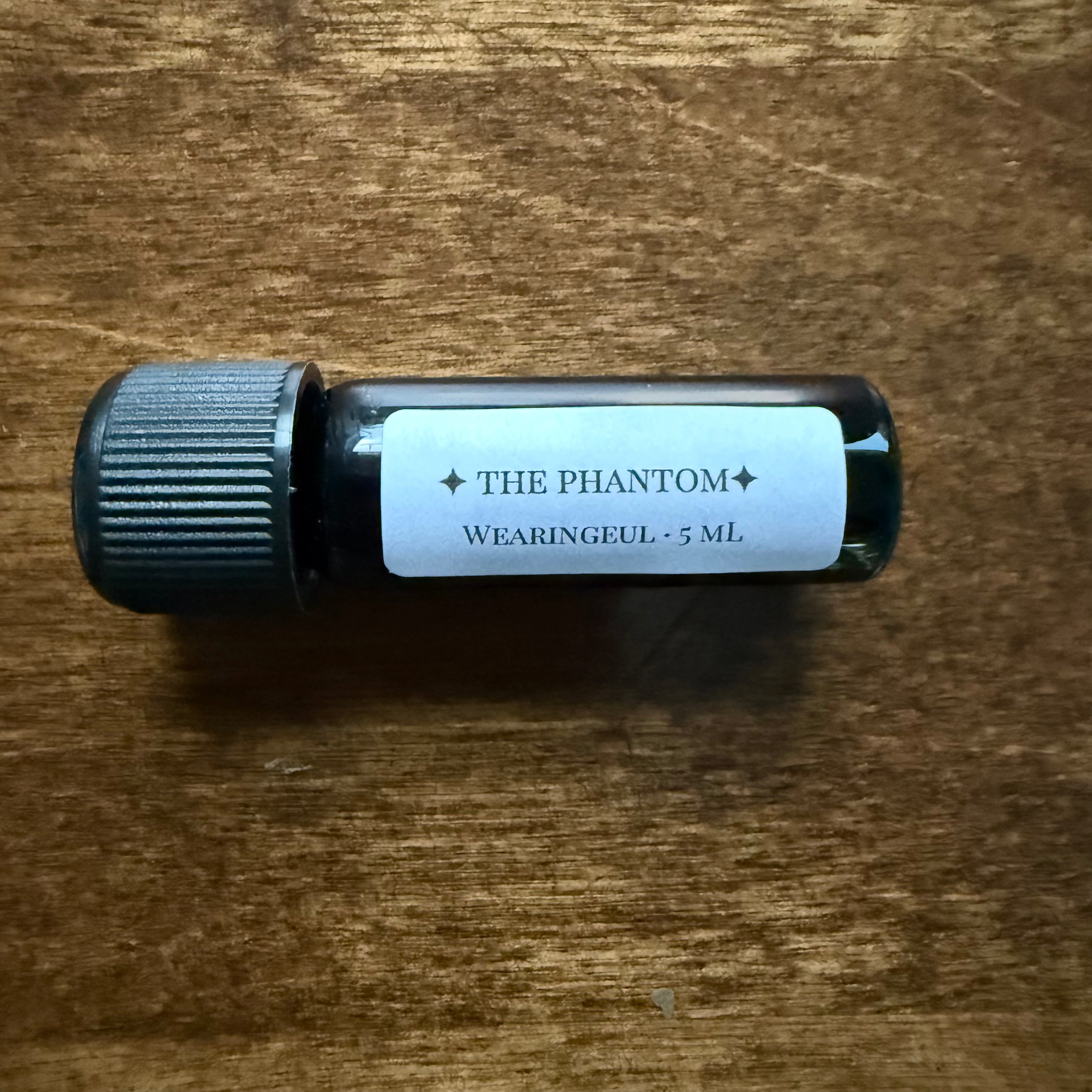 Close-up of Wearingeul The Phantom of the Opera 5 mL Archive Bottle and label