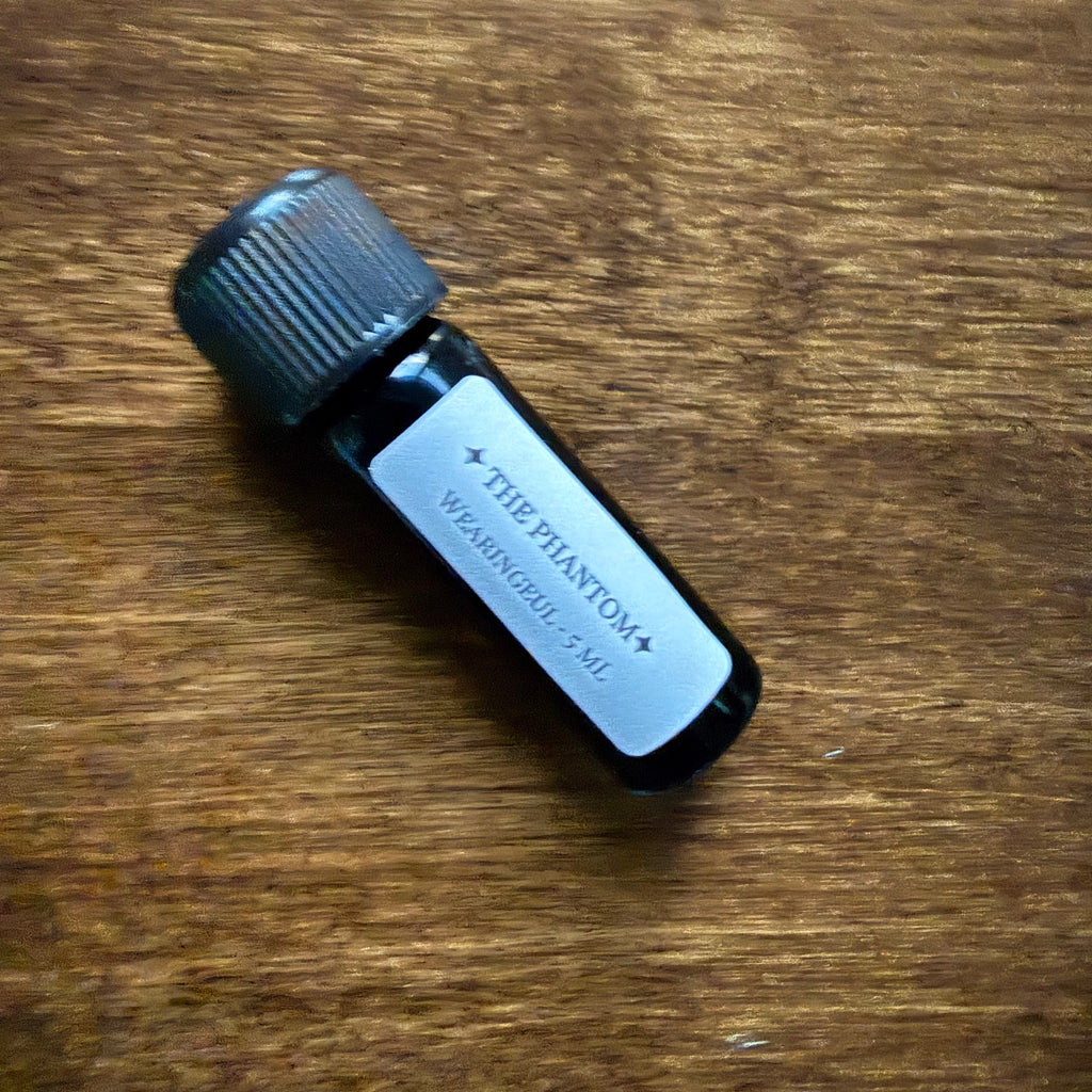 Angled view of Wearingeul The Phantom of the Opera blue fountain pen ink Archive Bottle
