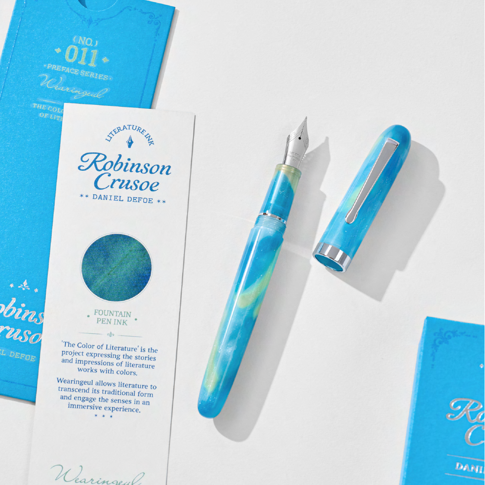 Wearingeul Robinson Crusoe Preface Series fountain pen in emerald blue and green cellulose acetate with silver-tone trim and literary packaging.