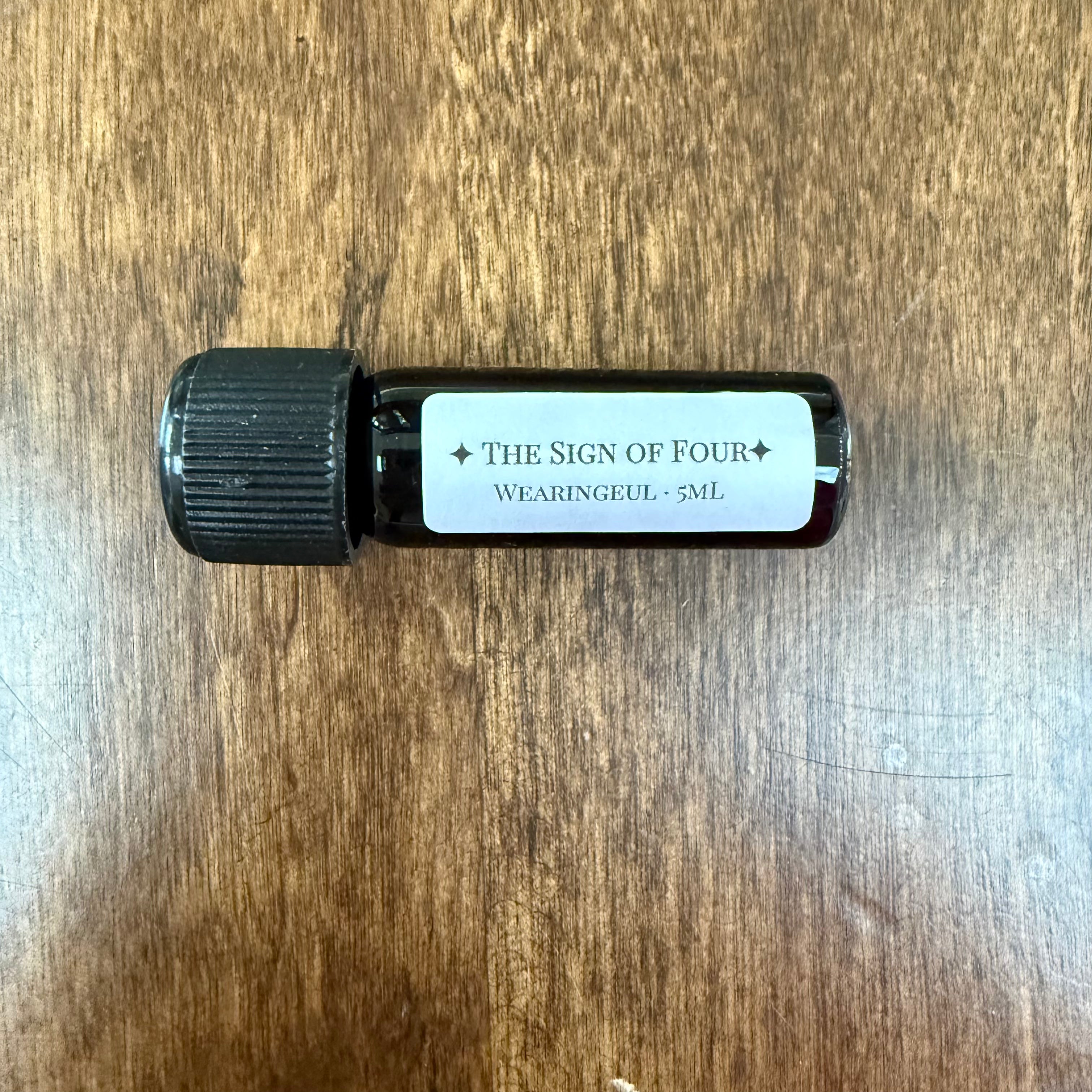 Wearingeul The Sign of Four 5 mL Archive Bottle photographed by Boston Lore Studio