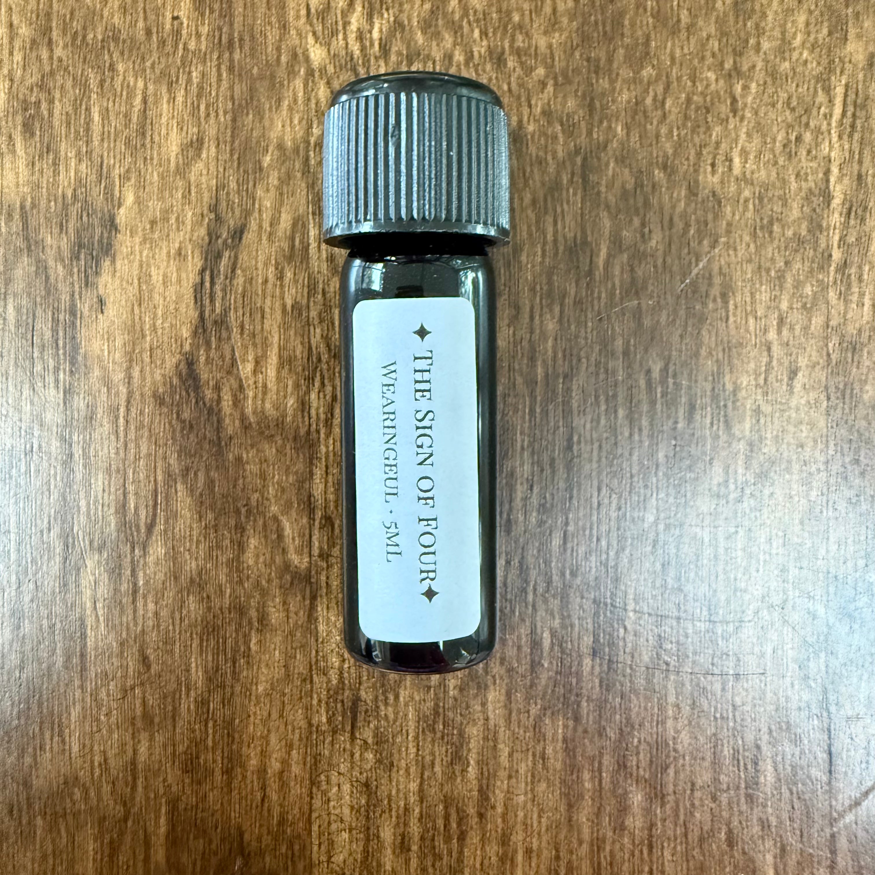 Wearingeul The Sign of Four 5 mL Archive Bottle photographed by Boston Lore Studio