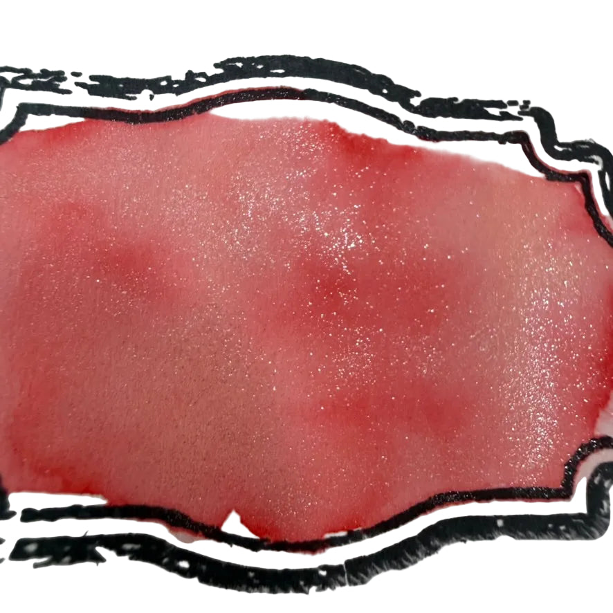 Boston Lore Studio swatch of Wearingeul Thumbelina fountain pen ink showing coral-pink ink with shimmer