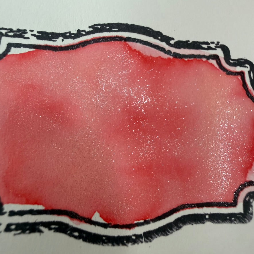 Boston Lore Studio swatch of Wearingeul Thumbelina coral-pink shimmering fountain pen ink